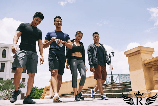 low-angle-shot-athletic-team-walking-outdoors-after-joint-workout_1098-19240.png